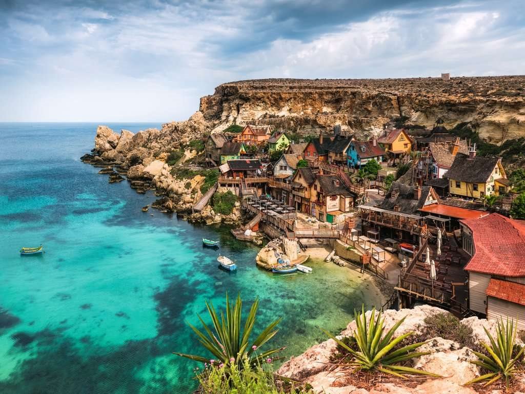 Popeye falu, Málta Ravensburger 1500 darabos kirakó puzzle (RA - 17436) - puzzlegarden